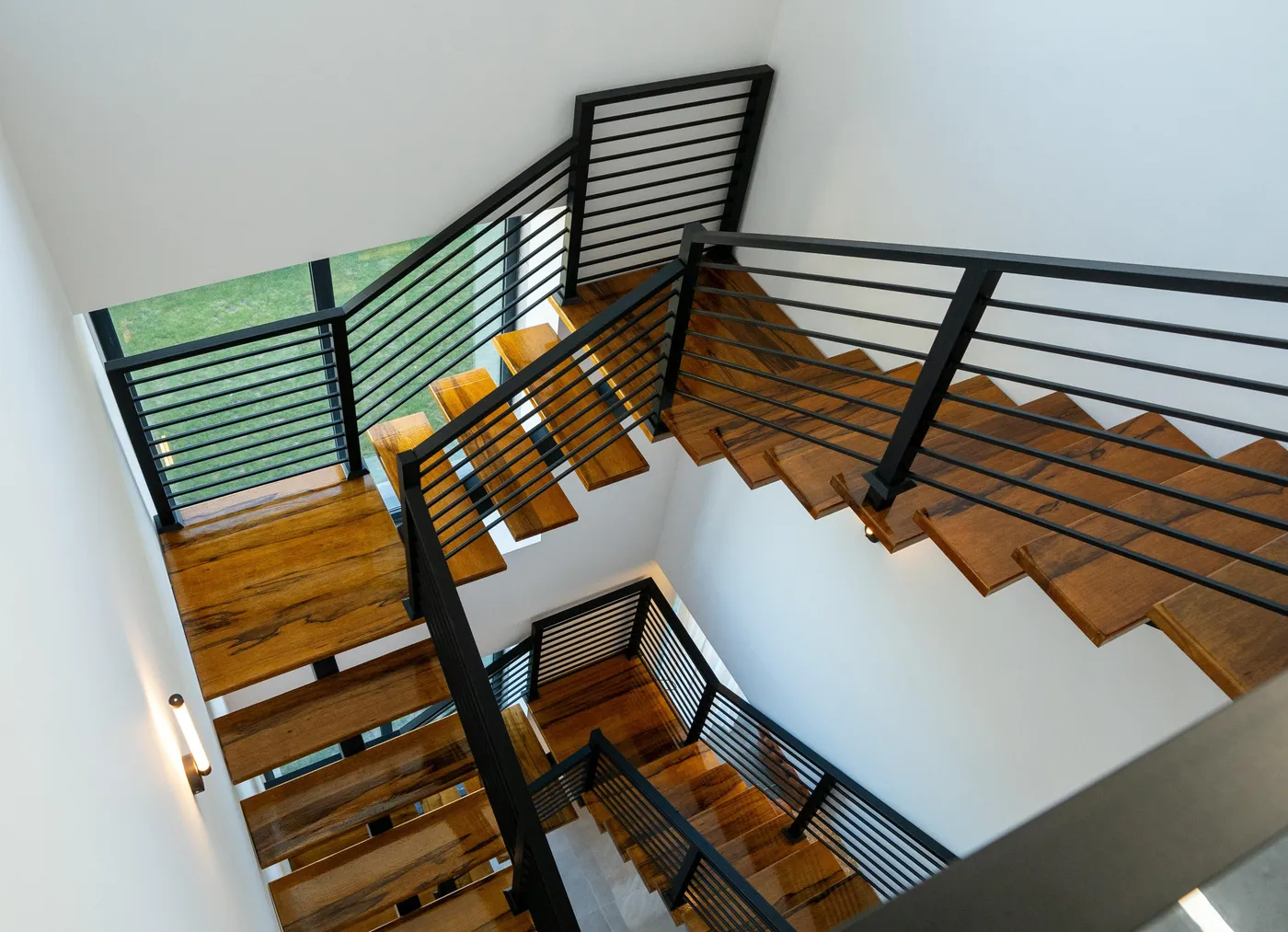 Custom floating stair installation in progress in a Miami home