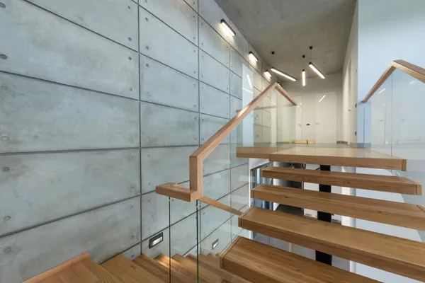 Laser-cut steel floating stair structure components ready for installation in Miami